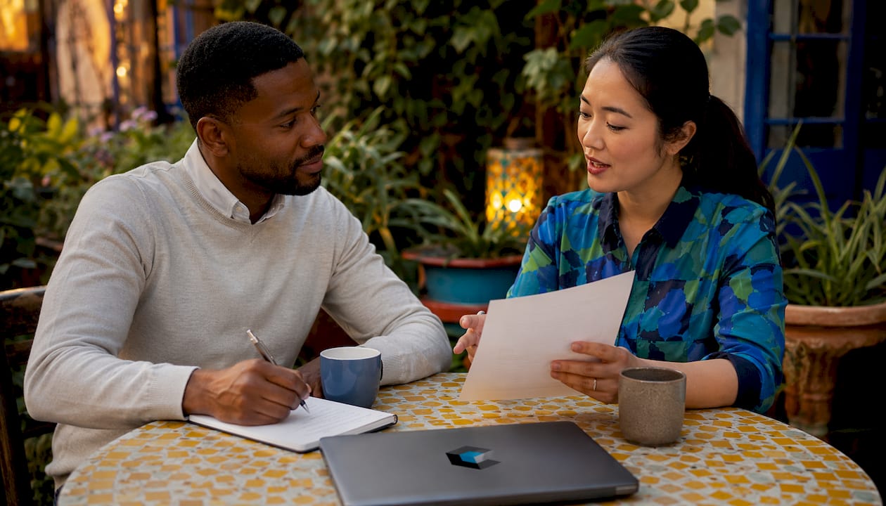 Colleagues discussing sales candidate interview